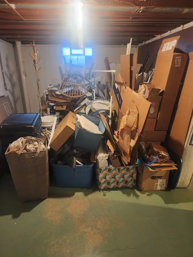 Roll-off dumpster container at job site for 2 Yard Dumpster Rental in Waterford